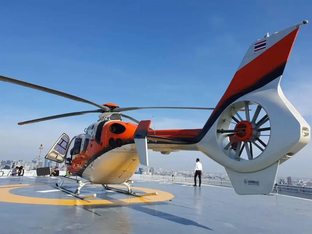 airbus ec 135 helicopter on a bangkok helipad