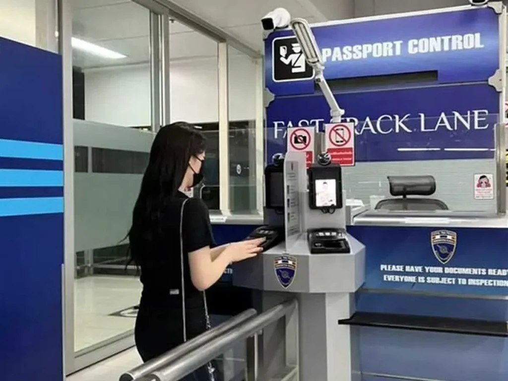 airport staff escorting passenger through fast track service