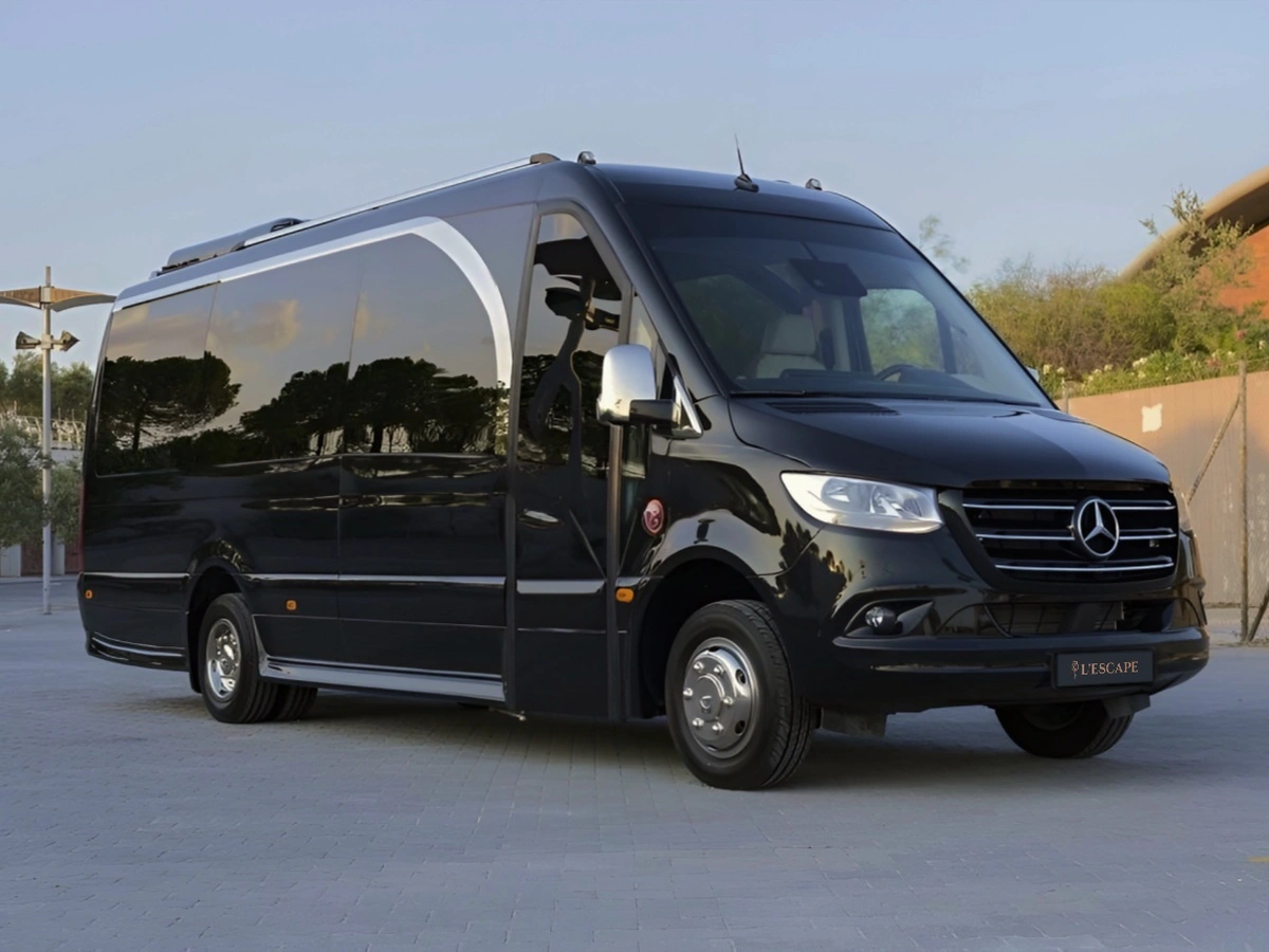 Black Mercedes sprinter with tinted windows