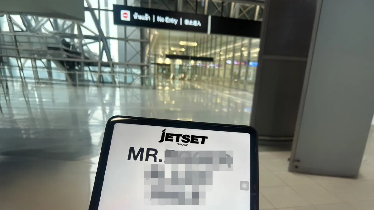 Meet and greet sign with passenger name at Bangkok airport