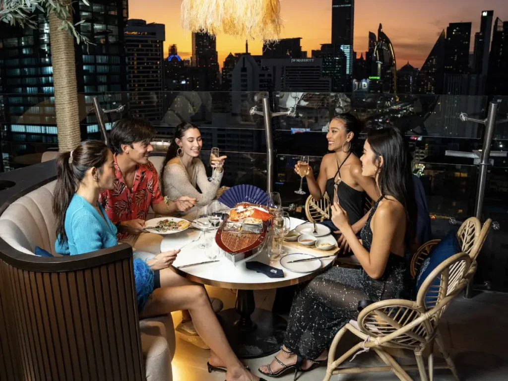 group dinner at pastel rooftop bangkok